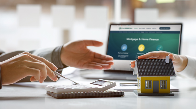 mortgage banker shaking hands with business woman